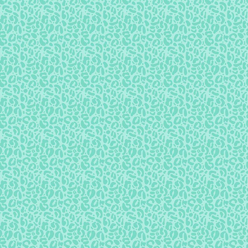 May include: A seamless pattern with a light blue background and white abstract shapes resembling animal print.