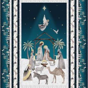 May include: A rectangular fabric panel featuring a nativity scene with a central manger, figures, and animals under a dark teal sky with a bright star and angel. The border displays a repeating pattern of palm trees, camels, and figures.