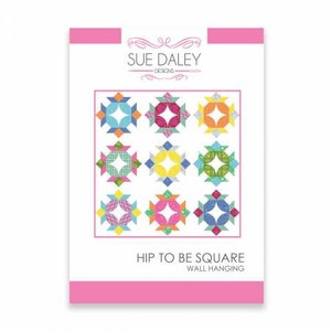 May include: A pink and white printable pattern for a quilt called "Hip to Be Square" wall hanging. The pattern features a grid of nine colorful squares with geometric designs.