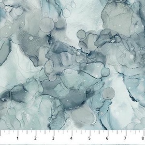 May include: Abstract watercolor painting with swirling blue and gray patterns. The colors are muted and blend together seamlessly, creating a calming and ethereal effect.