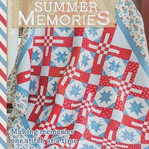 May include: A quilt featuring a repeating pattern of red and white polka dot strips and light blue star motifs on a white background. The quilt has a floral border and text overlays that read "SUMMER MEMORIES" and "Making memories one stitch at a time with Susan Ache!"