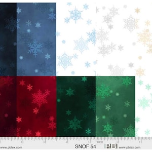 May include: A fabric panel featuring various snowflake patterns in shades of blue, red, and green on a white background. The snowflakes vary in size and are scattered across the panels. The bottom of the image includes a ruler and the text "SNOF 54".