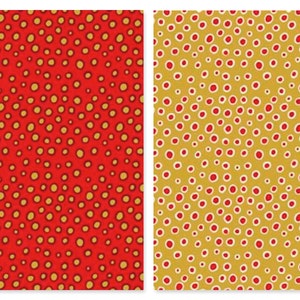 May include: Two fabric swatches with a repeating pattern of small red and gold circles on a red and gold background.