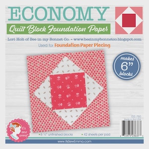 May include: Economy Quilt Block Foundation Paper with a sample quilt block design. The paper is used for foundation paper piecing and makes 6" blocks. The sample block features red and white floral patterns.