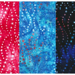 May include: Three fabric panels with a white star pattern on a red, blue, and black background. The fabric is a batik style with a tie-dye effect.