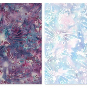 May include: Two fabric swatches with a repeating pattern of shooting stars and small stars. The first swatch is a purple and blue tie-dye with white shooting stars. The second swatch is a light blue tie-dye with white shooting stars.