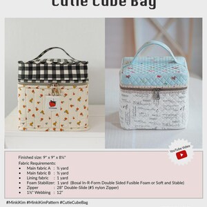 May include: Two "Cutie Cube Bag" examples are shown. One has a black and white checkered top and a cream-colored body with a strawberry pattern. The other has a light blue quilted top and a white body with script. The bags are approximately 9" x 9" x 8.25".