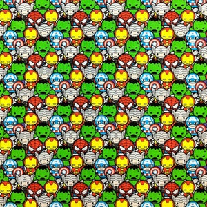 May include: A colorful fabric with a repeating pattern of cartoon superhero characters. The characters include Iron Man, Thor, Captain America, Hulk, and Spiderman. The fabric is a great choice for crafting projects, quilting, and sewing.