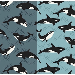 May include: A repeating pattern featuring stylized black and white orcas on a teal and dark teal background. The orcas are depicted in various poses, with some swimming and others leaping. The background has a speckled texture.