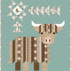 May include: A patchwork quilt featuring a stylized Highland cow with brown and tan patterned fabric. The quilt has a light blue background with a star and arrow design, and a border with a pink and white stripe pattern.