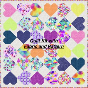 May include: A quilt kit with fabric and pattern. The kit features a variety of colorful heart-shaped fabric pieces in a patchwork design. The fabric pieces are in shades of pink, purple, blue, green, yellow, and orange. The text "Quilt Kit with Fabric and Pattern" is printed in black on a white background.