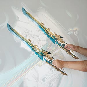 May include: Two decorative swords with gold and teal accents. The swords have intricate designs and are held by a person's hands.