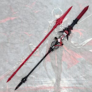 May include: Two long, pointed polearms are displayed diagonally. One is a solid, vibrant red spear with a sharp, tapered head and a textured handle. The other is a complex, multi-layered spear featuring a black and red color scheme with intricate, angular geometric details and a pointed tip.