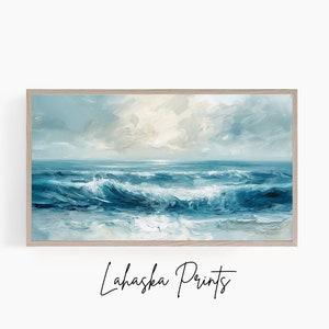 May include: A framed painting of a seascape with blue and white waves crashing against the shore. The sky is a light blue with white clouds. The painting is in a light wood frame.