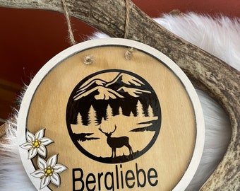 Wooden sign mountain love with edelweiss