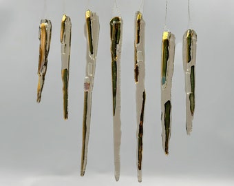 Elevate Your Holiday Decor with Handmade Crystal Glass Icicle Ornaments, Each Infused with Gold, Adding Elegance to Your Festive Season.
