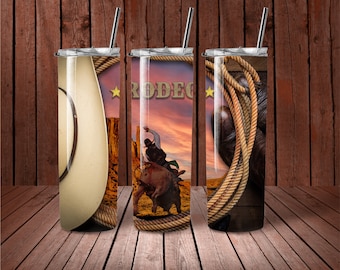 May include: Three stainless steel tumblers with different designs. The first tumbler features a cowboy hat, the second tumbler features a cowboy riding a bull with the word "RODEO" on the tumbler, and the third tumbler features a lasso.
