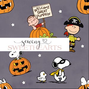 May include: A repeating pattern featuring Halloween-themed Peanuts characters. Charlie Brown in a pirate costume, Snoopy as the Flying Ace, and Linus holding a sign that reads "Welcome Great Pumpkin" are shown with carved pumpkins and stars on a grey background.