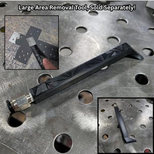 May include: A black plastic tool with a textured surface and a 90-degree angle. The tool is designed for removing large areas of material. The tool is shown on a metal surface with a grid pattern. "Large Area Removal Tool, Sold Separately!" is written in the image.