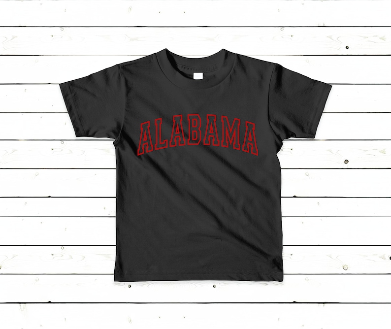 May include: Black t-shirt with a red outline of the word "ALABAMA" printed on the front.