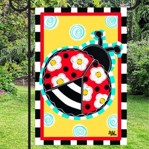 May include: A garden flag featuring a whimsical ladybug design. The ladybug has a red body with black spots and white flower accents. The background is yellow with blue swirls. The flag is framed with a black and white striped border.
