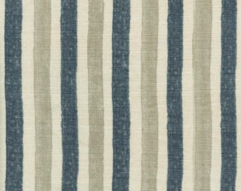 May include: A close-up of a striped fabric with alternating blue and beige stripes. The fabric has a textured, linen-like appearance.