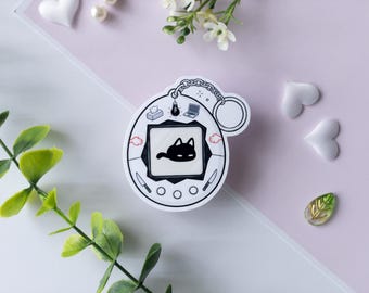 Omori Mewo White Space Tamagotchi Sticker - Matte Vinyl Stickers
