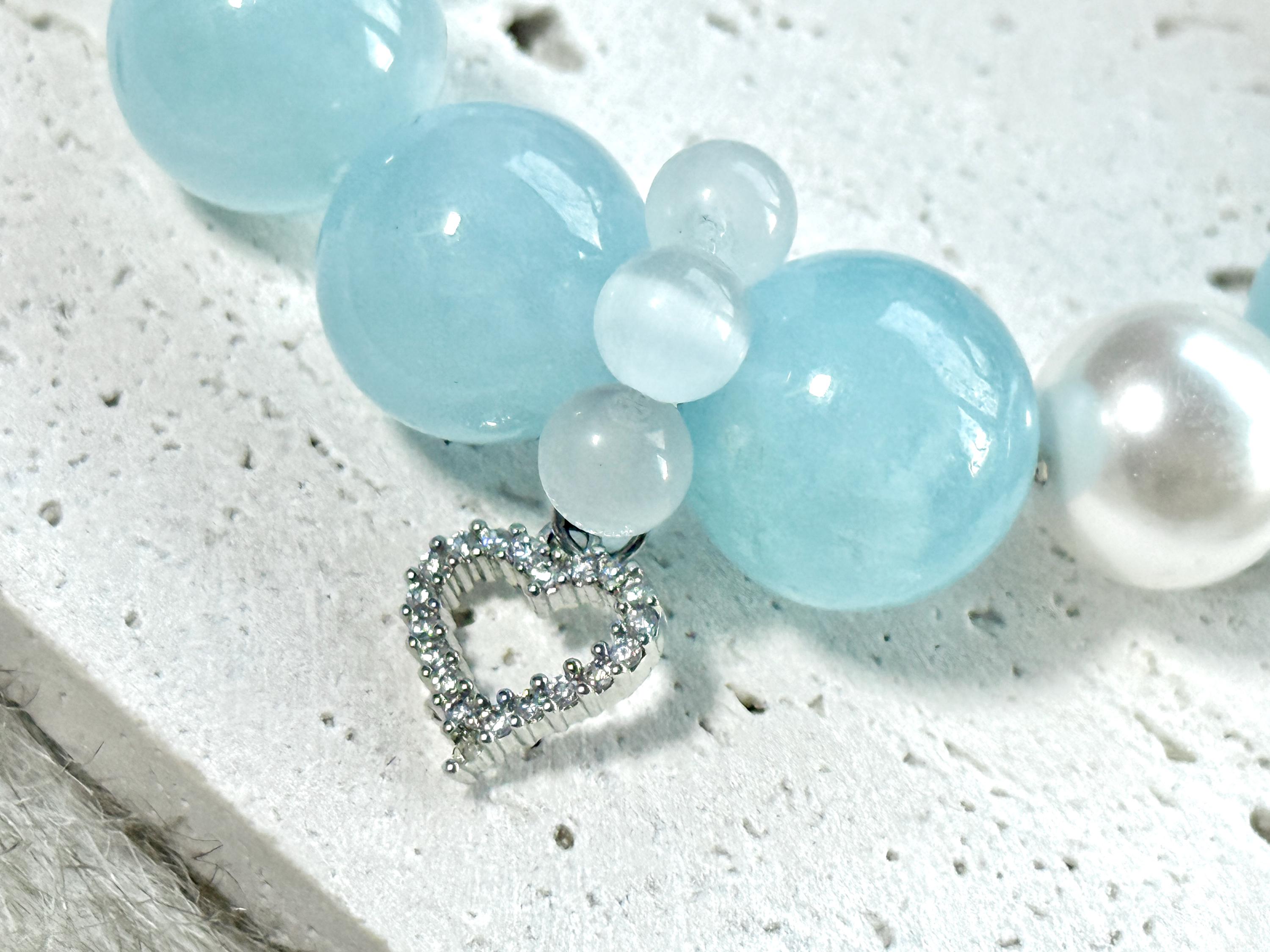 ホワイトファントムクォーツのセンターピースとブルームーンストーンの