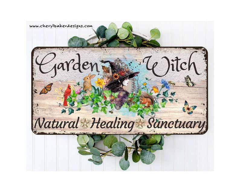 May include: A rustic wooden sign with the text "Garden Witch Natural Healing Sanctuary". The sign features a whimsical illustration of a witch with a black hat and flowing purple dress surrounded by flowers, butterflies, and woodland creatures.