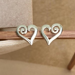 Gold heart earrings, swirl heart studs, romantic minimalist earrings, dainty love earrings, elegant gold studs