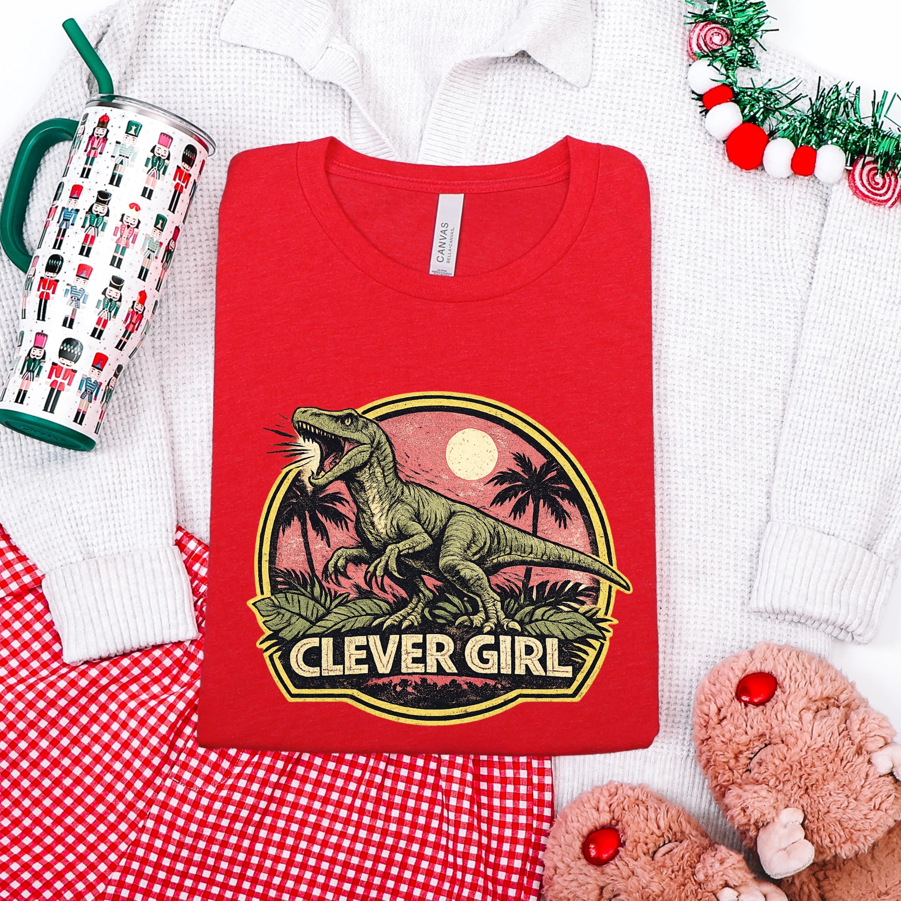 Clever Girl Dinosaur Shirt, Vintage Jurassic Style T-Shirt & Sweatshirt, Funny Dinosaur Graphic Tee, Unisex Adult and Youth | Raptor Shirt