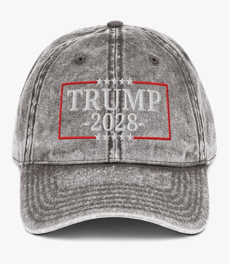 May include: A gray, distressed, cotton baseball cap with a red and white embroidered design that says "TRUMP 2028".
