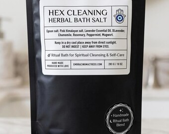 May include: A black pouch of Hex Cleaning Herbal Bath Salt with a white label featuring a hamsa symbol. The label lists ingredients including Epsom salt, Pink Himalayan salt, and herbs, with a net weight of 10 oz. A round sticker reads Handmade Ritual Bath Blend.