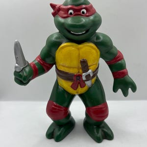 Statuetta in ceramica vintage dipinta a mano di Raffaello TMNT e gioco portatile Mirage