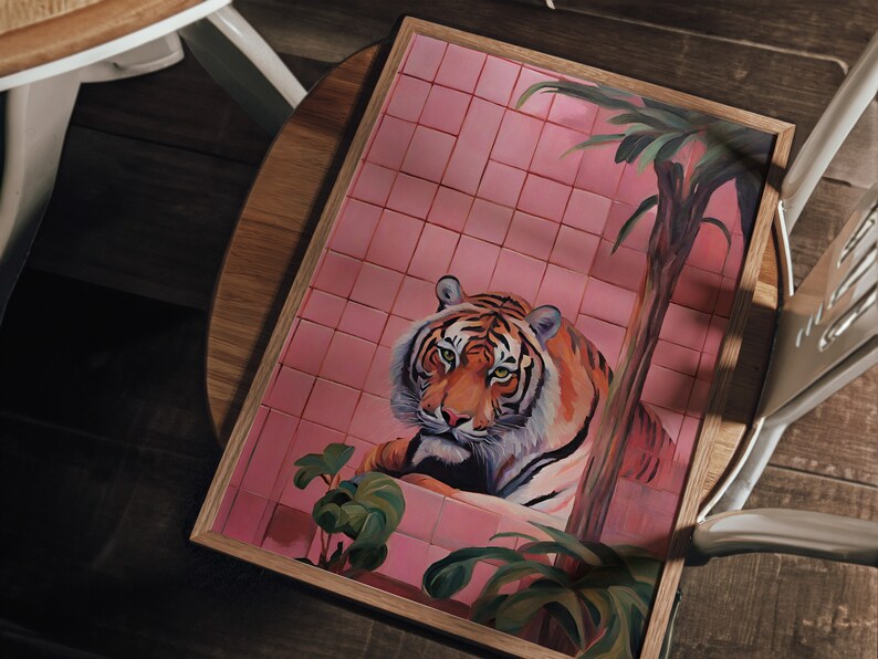 May include: A framed painting of a tiger sitting in a pink tiled room with a palm tree in the background. The tiger is looking directly at the viewer.