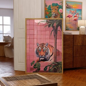 May include: A framed print of a tiger in a pink tiled bathroom with a palm tree in the background.
