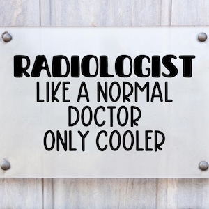 May include: A silver metal sign with black text that reads "Radiologist like a normal doctor only cooler".