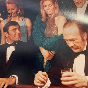 JB2 - James Bond Actor George Lazenby as James Bond 007 Autographed Photo with COA.