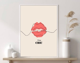 May include: A minimalist art print with a single line drawing of a pair of red lips. The text "Stay Chic" is below the lips.
