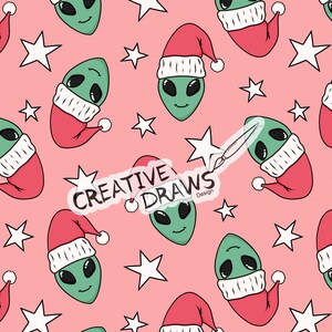 May include: A seamless pattern featuring green alien heads wearing red Santa hats with white trim on a pink background. White stars are scattered throughout the pattern. The text "CREATIVE DRAWS Design" is included in the pattern.