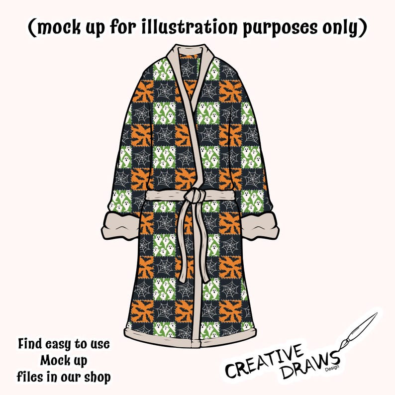 May include: A Halloween dressing gown with a patchwork design featuring ghosts, bats, and spiderwebs on a black background. The robe has a cream-coloured trim and a matching belt. The text "Find easy to use Mock up files in our shop" is visible.