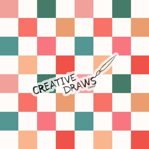 May include: A checkered pattern with alternating squares of peach, red, pink, and teal. The pattern is repeated throughout the image. The words "Creative Draws Design" are written in a white circle with a black outline.