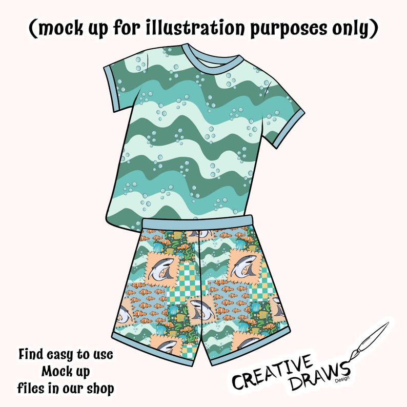 May include: A two-piece pyjama set with a short-sleeved top and shorts. The top has a wavy teal and green pattern with bubbles. The shorts have a shark and fish pattern. The text "CREATIVE DRAWS" is visible.