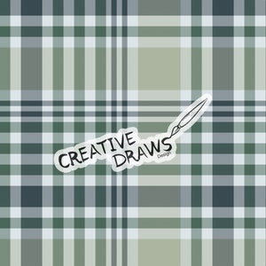 May include: A seamless pattern of green, white, and gray plaid with a white sticker that says "CREATIVE DRAWS Design" and a drawing of a paintbrush.