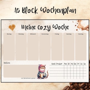 Könnte beinhalten: A5 Block Wochenplan Wochenplaner mit dem Text "Meine cozy Woche". Der Planer zeigt eine Katzenillustration, einen Habit Tracker und Platz für Notizen. Der Hintergrund hat ein Kaffeebohnen-Design.