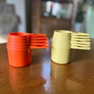 Tupperware Measuring Cupspre-owned READ DESCRIPTION Lots of  Varietyvintagevarious Colors/sizes 1970s, 1980s, 1990s 