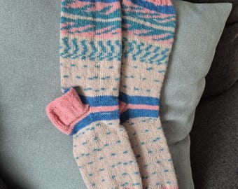 Cheerful hand knitted wonderfully warm ladies socks. Knitted with Regia Pairfeck design line socks wool.