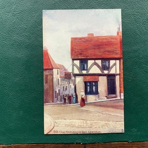 The Old Arlequin Inn Lincoln. Raphael Tuck - Oilette - Carte postale ancienne de 6405 coins pittoresques. Carte postale d'art ancienne auberge anglaise de 1904. PC99