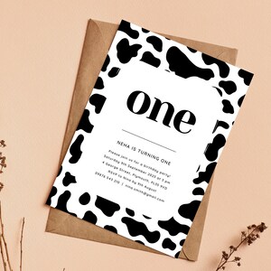 May include: A black and white cow print birthday party invitation with the text "one" and "NEHA IS TURNING ONE". The invitation includes the date, time, and location of the party.