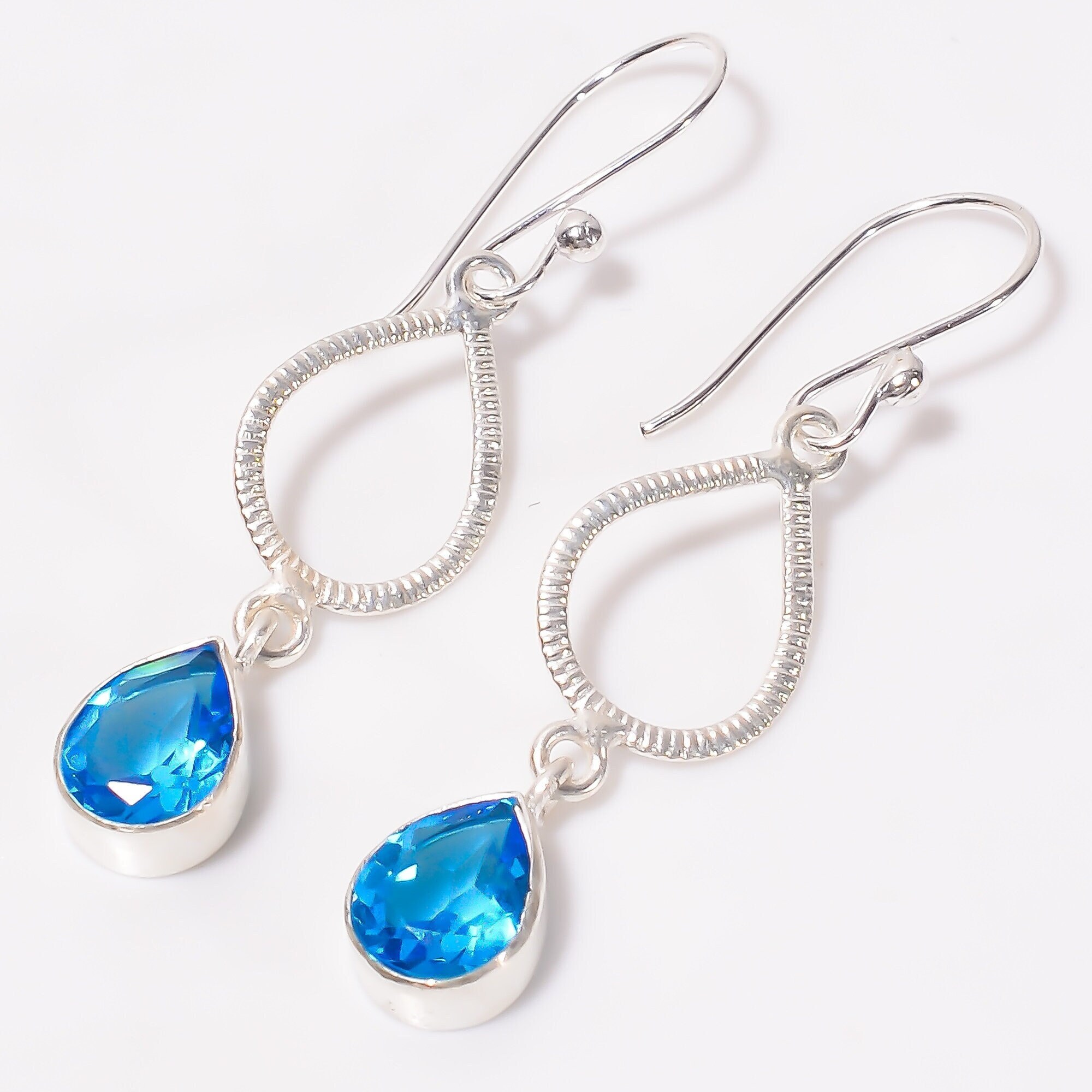 BuySend Glamourous Double Tear Drop Earrings Online FNP